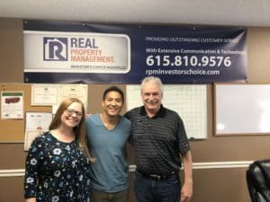 2 property managers posing with Kenji