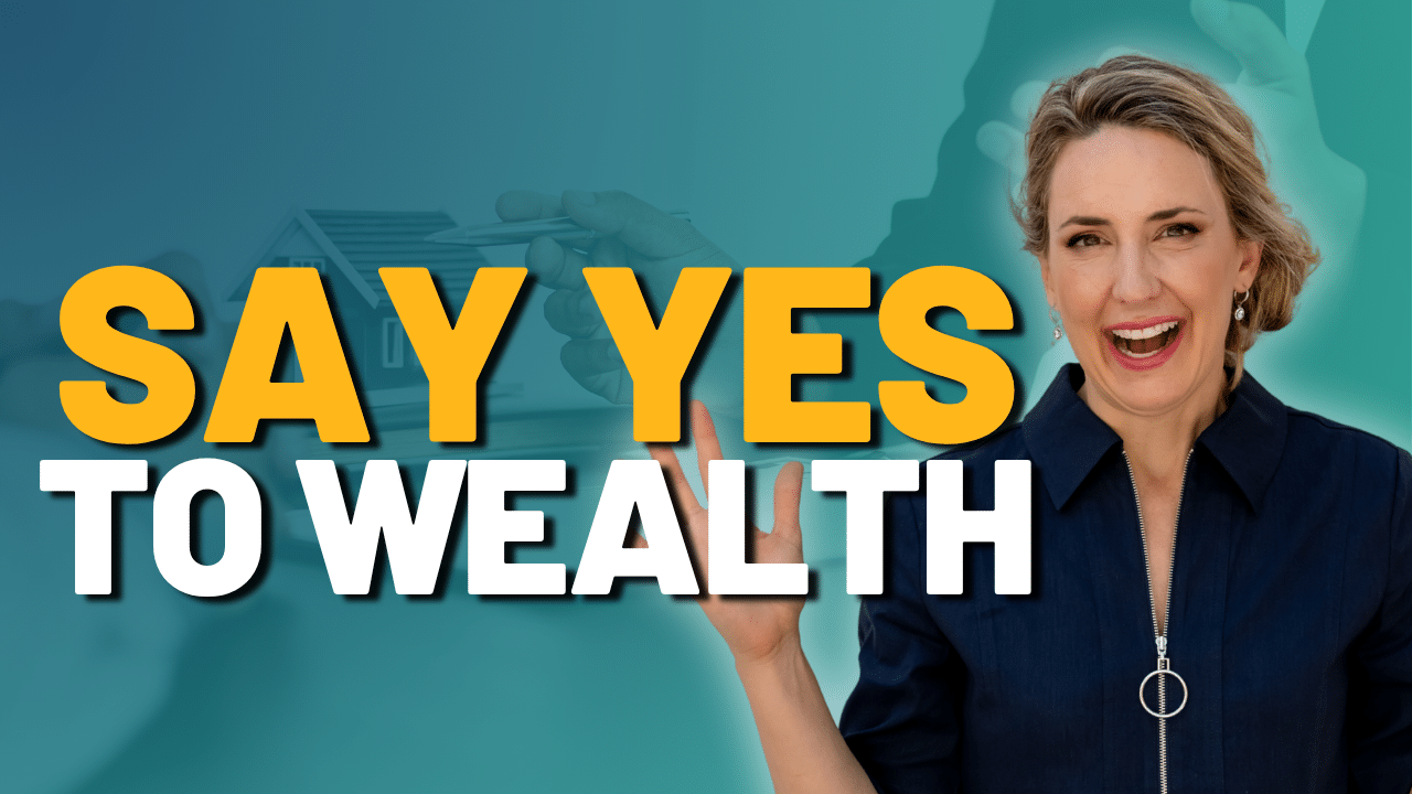 Smiling woman in a dark shirt gestures beside bold text that reads “SAY YES TO WEALTH” against a teal background with a faint image of hands exchanging money.